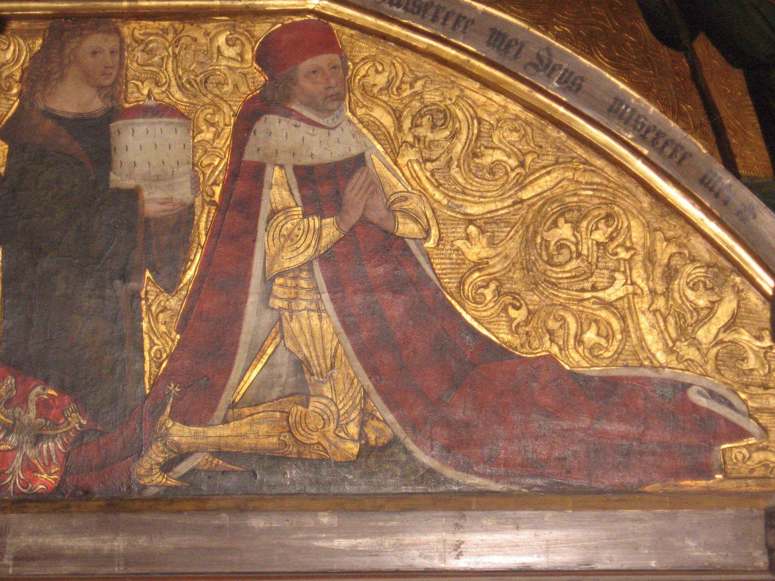 Vyobrazení Albrechta Achilla na predelle jím darovaného oltáře Labutího řádu (1484) v kostele sv. Gumberta.