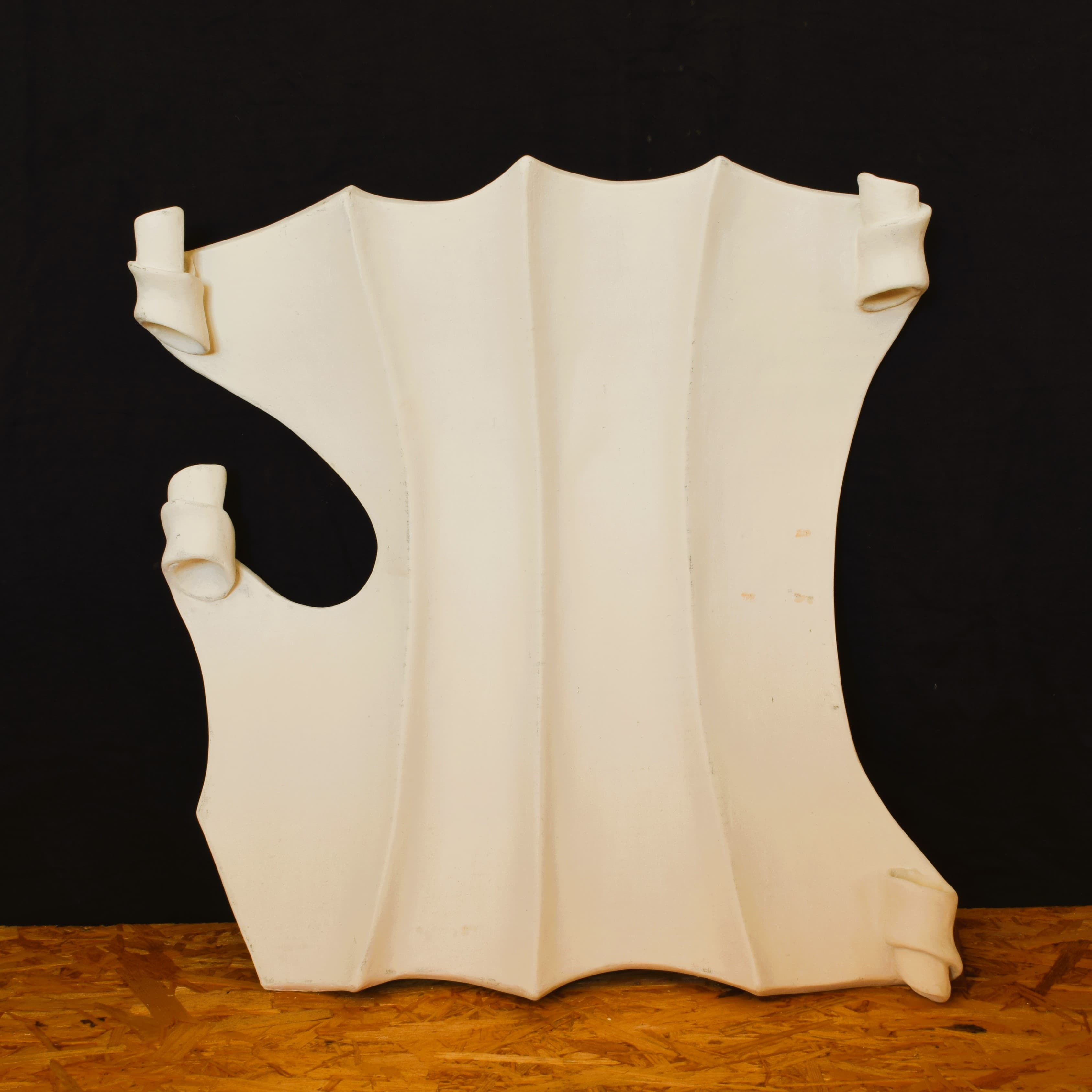 Corpus painted with gesso and polished