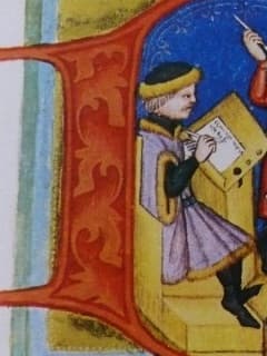 Kabát a nohavice ve stejné (černé) barvě. Výřez z Brněnské právní knihy Václava z Jihlavy (1446).